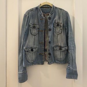 Vintage jean jacket in size Medium.